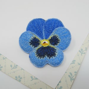 Embroidered pansy brooch, pansy pin, textile art, soft sculpture.