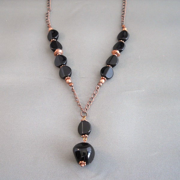 Antiqued copper chain with black glass and copper beads.