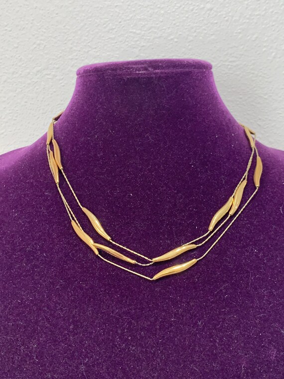 Vintage Monet gold tone triple strand necklace! NW