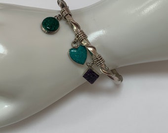 Vintage by designer Carolyn Pollack, .925 Silver Silver cuff bracelet with three dangle charms, turquoise, malachite and sugilite inlay!