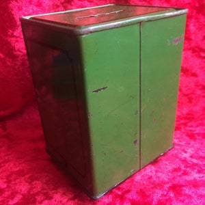 A lovely old vintage money box in the form of a old safe strong box tin with cast base. image 3