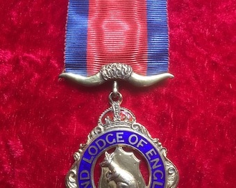 A silver hallmarked masonic medal Grand Lodge of England London 1955 Goodchild Saxon lodge.