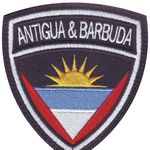 May include: Embroidered patch with a navy blue background and white border. The patch features the Antigua and Barbuda flag with a yellow sun rising over a blue and white triangle.