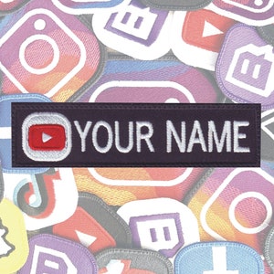 May include: A black and white embroidered patch with a YouTube logo and the text "YOUR NAME". The patch is surrounded by various social media logos.