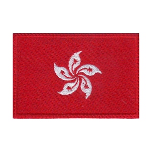 May include: A red embroidered patch with a white stylized flower design. The flower has five petals and is a symbol of Hong Kong.