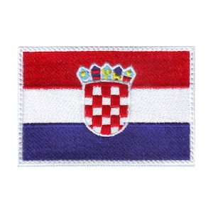 May include: Embroidered patch featuring the flag of Croatia. The rectangular patch has horizontal stripes of red, white, and blue. The Croatian coat of arms is centered on the patch, with a red and white checkered shield topped with a crown.