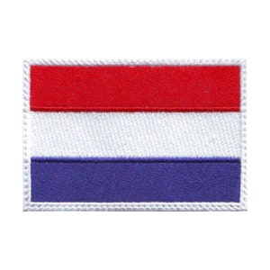 Peut inclure: Un patch brodé rouge, blanc et bleu avec une bordure blanche. Le patch présente les couleurs du drapeau néerlandais.