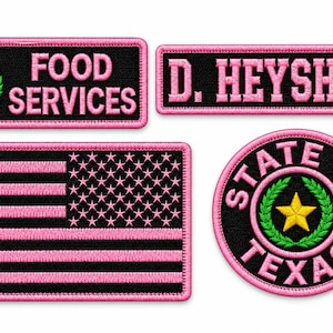 May include: Four embroidered patches with pink borders and black backgrounds. One rectangular patch reads FOOD SERVICES with a yellow star and green wreath. One rectangular patch reads D. HEYSHAM. One rectangular flag patch. One circular patch reads STATE OF TEXAS.
