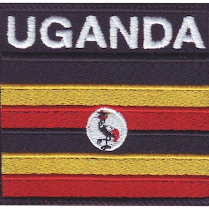 May include: Embroidered patch with the word "UGANDA" in white letters on a black background. The patch features the Ugandan flag with six horizontal stripes in black, yellow, red, black, yellow, and red. The center of the flag has a white circle with a black crowned crane.