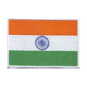 May include: An embroidered patch of the Indian flag. The flag is rectangular and features three horizontal stripes: saffron at the top, white in the middle, and green at the bottom. A blue wheel with 24 spokes is centered on the white stripe.