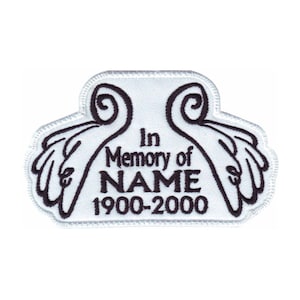 May include: White embroidered patch with angel wings and the text "In Memory of NAME 1900-2000".