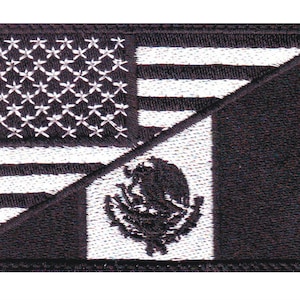 May include: Black and white embroidered patch featuring the American and Mexican flags, with the flags overlapping in a diagonal pattern.