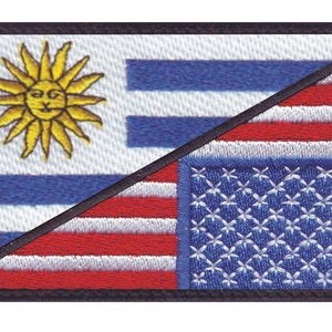 May include: A patch with the flags of Uruguay and the United States of America sewn together diagonally. The Uruguayan flag is on the top left and the American flag is on the bottom right.