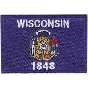 May include: Embroidered patch featuring the state seal of Wisconsin. The seal is a blue shield with a white eagle, a red and white striped banner, and a yellow anchor. The shield is surrounded by a yellow circle with a red and green wreath. The patch is on a purple background with the word "WISCONSIN" in white above the seal and the year "1848" in white below the seal.