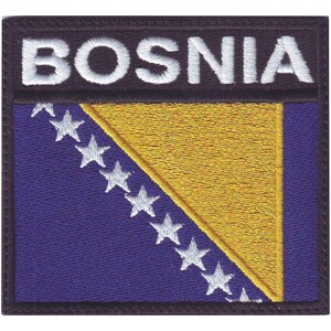 May include: Embroidered patch featuring the word "BOSNIA" in white capital letters above a design of the Bosnian flag. The flag design includes a blue field with white stars, a yellow triangle, and a black border.