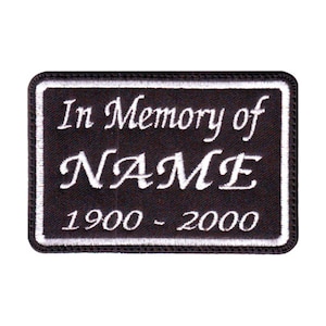 May include: Black embroidered patch with white stitching. The patch reads "In Memory of NAME 1900 - 2000".