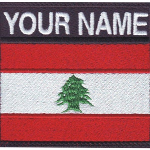 May include: A red, white, and green embroidered patch with the Lebanese flag and the text "YOUR NAME" above it.
