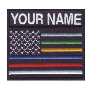 May include: An embroidered patch with a thin blue line, thin red line, and thin yellow line on a traditional American flag design. The patch has a white background with the text "YOUR NAME" in white.