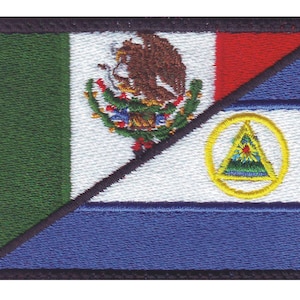 May include: Embroidered patch featuring the flags of Mexico and El Salvador. The Mexican flag is green, white, and red, with the coat of arms in the center. The El Salvador flag is blue and white, with a yellow emblem. The patch has a black border.