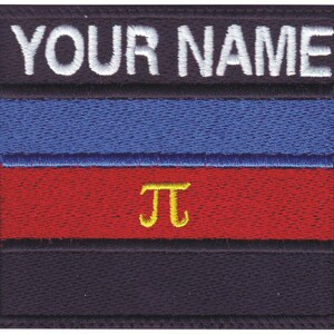 May include: A black embroidered patch with the text "YOUR NAME" in white. The patch features a blue, red, and black striped design with a yellow "pi" symbol in the centre.