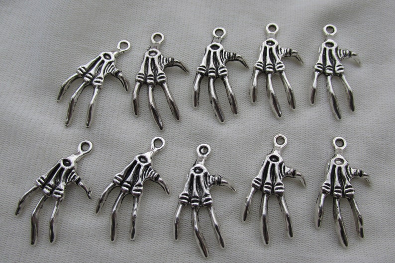 10 X Skeleton Hand Charms