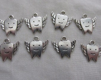 8 x Tibetan Silver Tooth Fairy Charms 18 x 20 mm