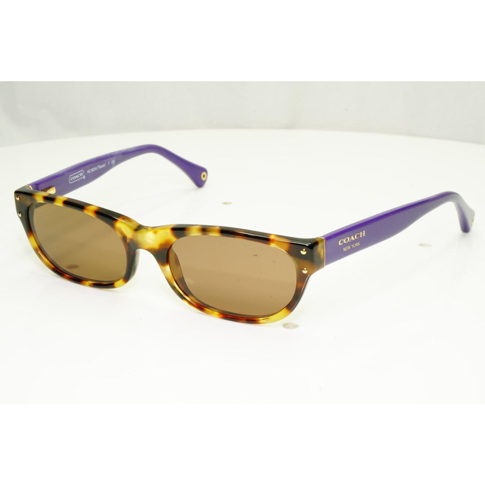 purple coach sunglasses