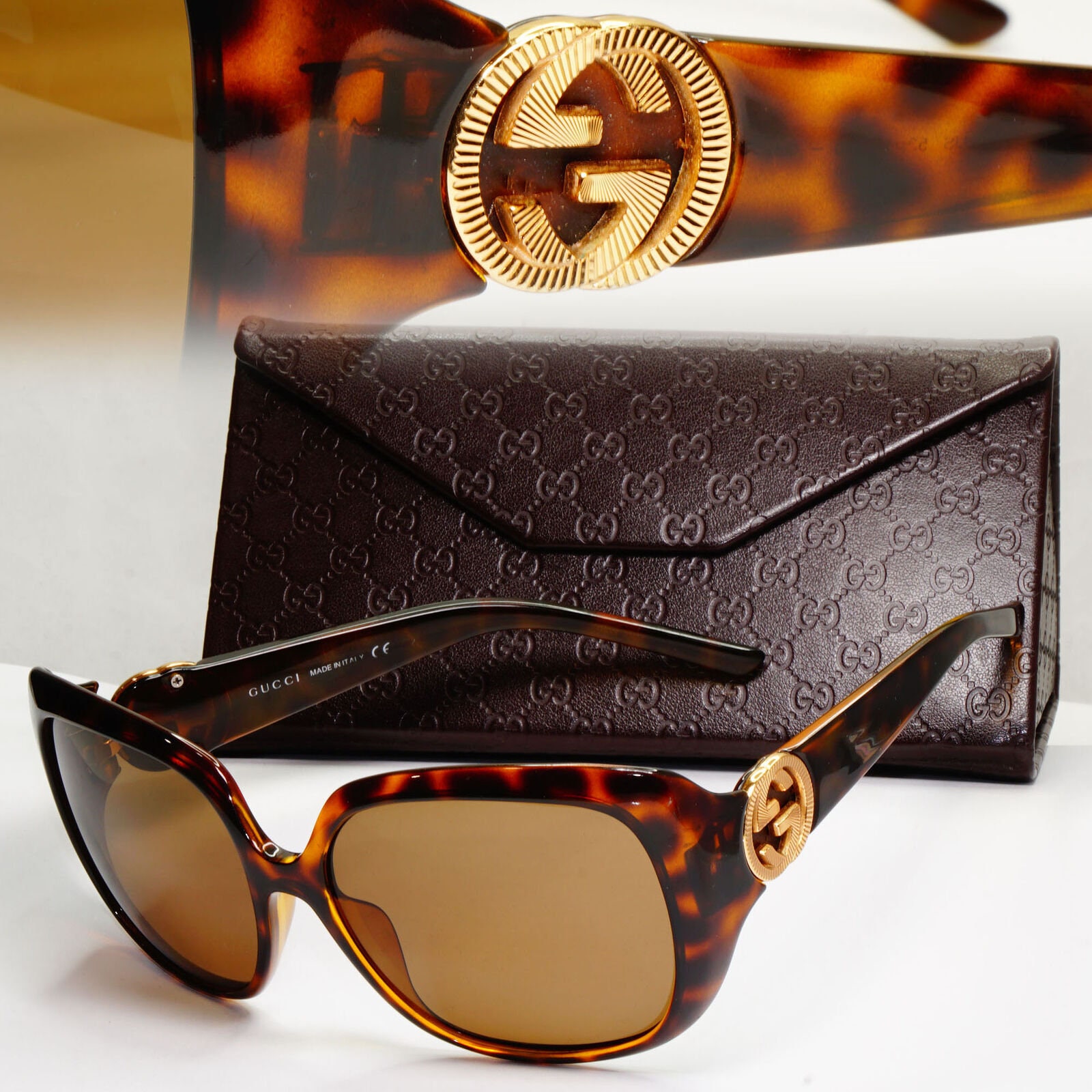 Gucci Gg Chain-charm Cat-eye Metal Sunglasses