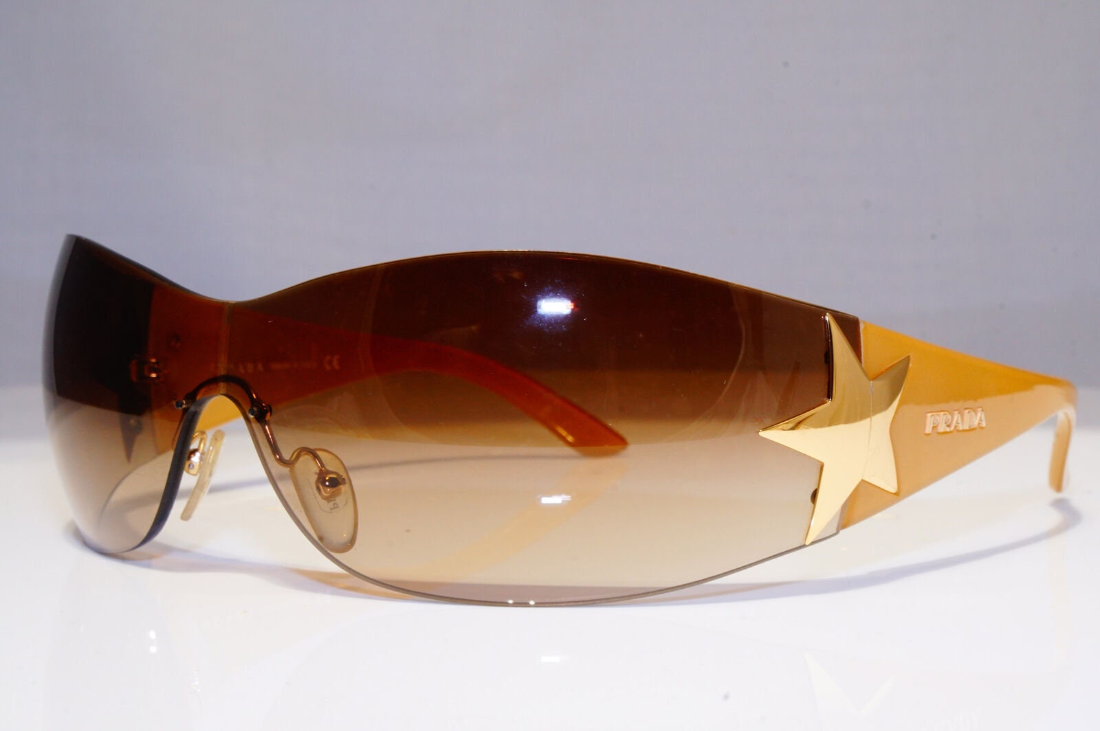 Prada Mens Womens Vintage Sunglasses Shield Gold Star Spr 72g - Etsy New  Zealand