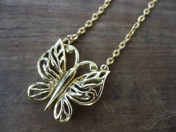 Goldtone Butterfly Necklace  - Gold Crown Inc.
