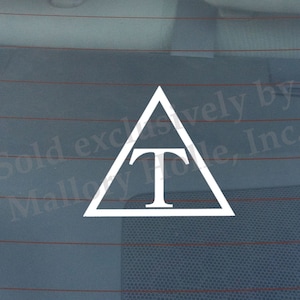May include: White vinyl decal of a triangle with a capital T inside. The decal is on a blue car window. The text "Sold exclusively by Mallory Hole, Inc." is visible in the background.