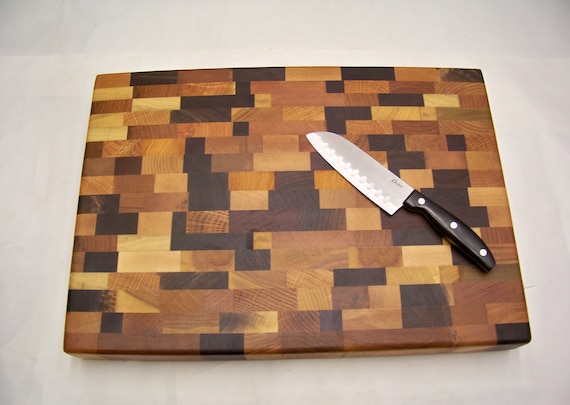 Primitive wood thick cutting board. Measures 12 by 13 and 1 1/2