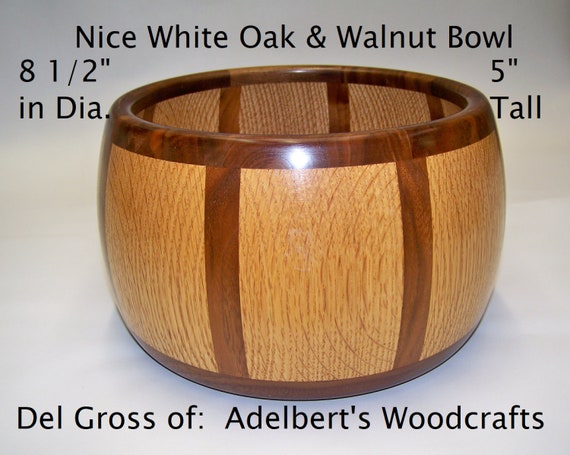 Beautiful, segmented candy bowl. 5" tall x 8 1/2" in dia. Oak & Walnut. Shipped in2 to 3 days.