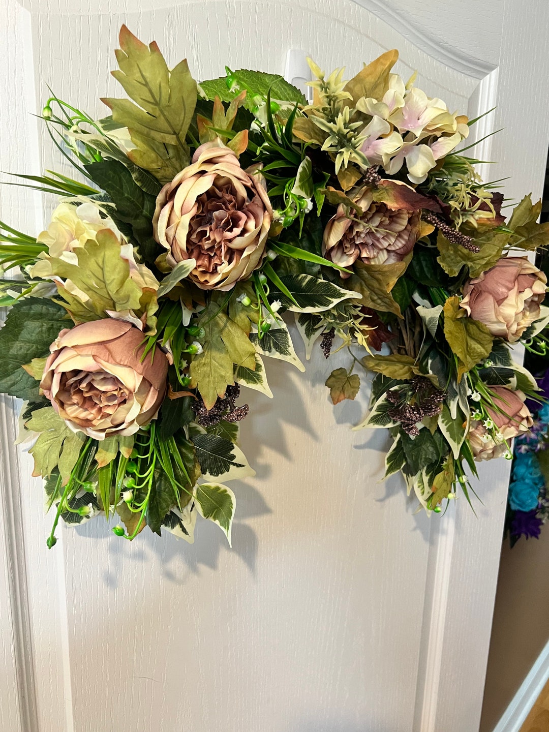 This is a Beautiful Grapevine Swag That Will Accent Any Wall in Your