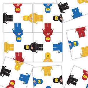 May include: A set of nine square tiles featuring a repeating pattern of colorful astronaut figures with different colored helmets and bodies. Each tile has a white background and features a different astronaut figure in each of the nine squares.