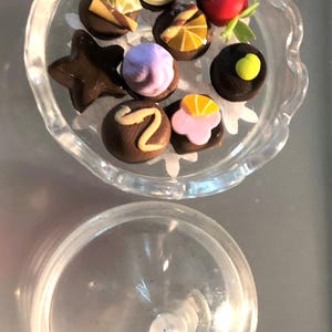 sweet little sets of detailed chocolates in a box kit or plastic or glass display stand in 1:12 size for dolls house or mini projects
