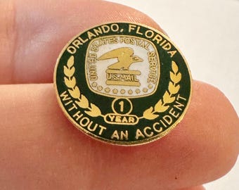 Pin de solapa antiguo del servicio postal estadounidense de Orlando, Florida, conmemorativo de un año sin accidentes.