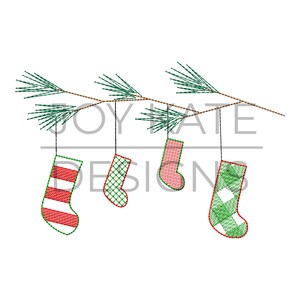 May include: Four Christmas stockings hang from a pine branch. The stockings are red and green with different patterns.