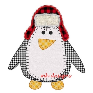 May include: A white penguin wearing a red and black plaid hat with a white brim. The penguin has black and white checkered wings and yellow feet. The penguin is outlined in black stitching. The text "mh designs" is visible below the penguin.