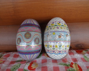 Pair of vintage tin egg candy containers - large eggs at 5 1/2" long - Charles Keller