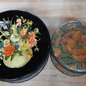 Pair of vintage collectible tins with floral patterns - Atlantic Can Company and Tindeco