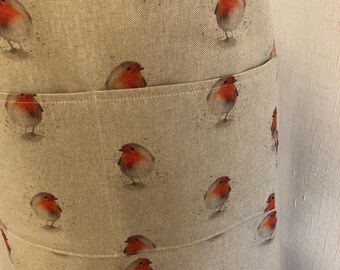 Aprons, seagull,dachshund,lavender,spot,green leaves,robin.