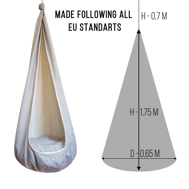 May include: Grey fabric hanging chair with a white lining. The chair is 1.75 metres tall and 0.65 metres in diameter. The chair is made following all EU standards.  H-0,7 M, H-1,75 M, D-0,65 M