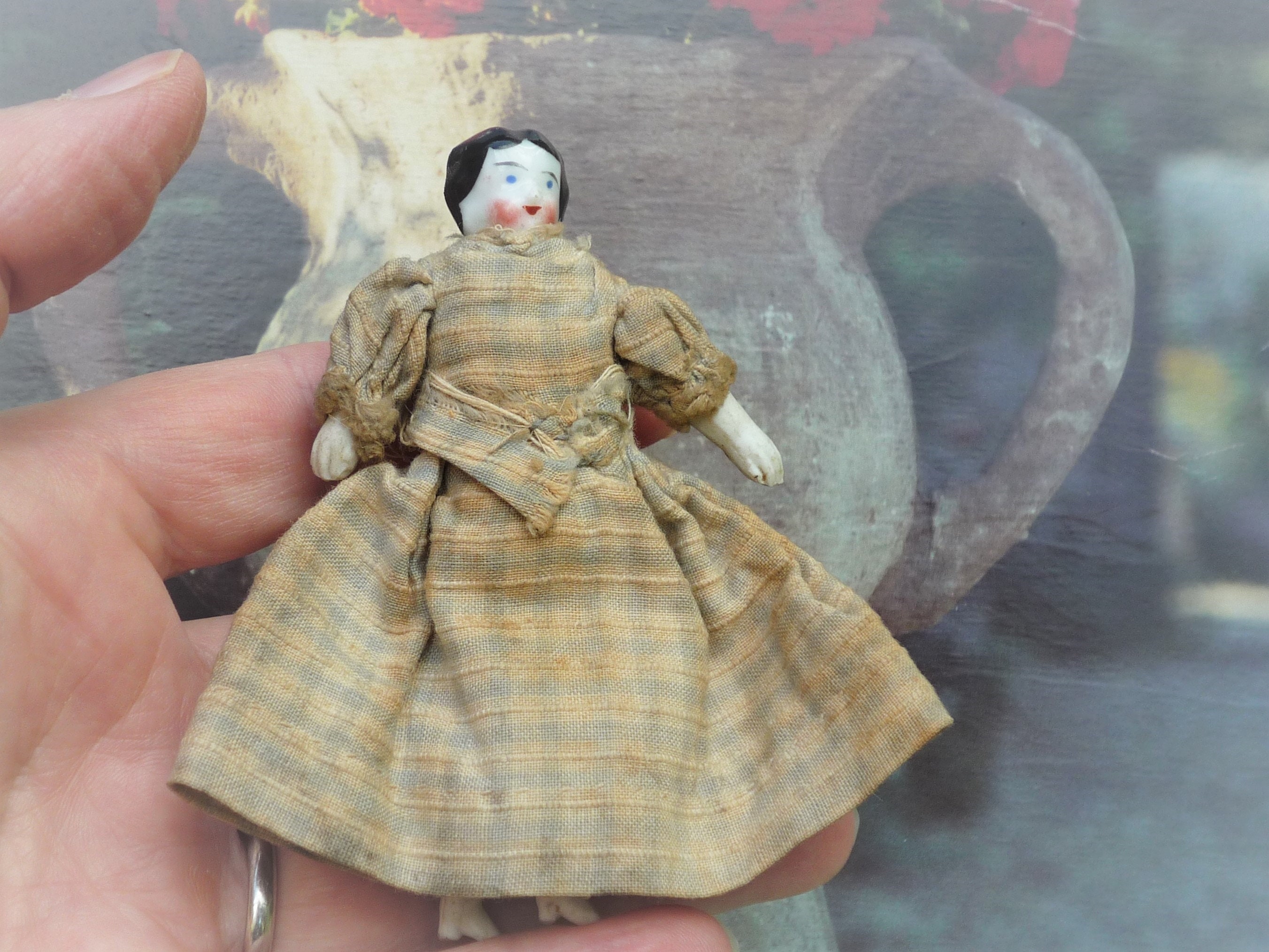 tiny porcelain dolls