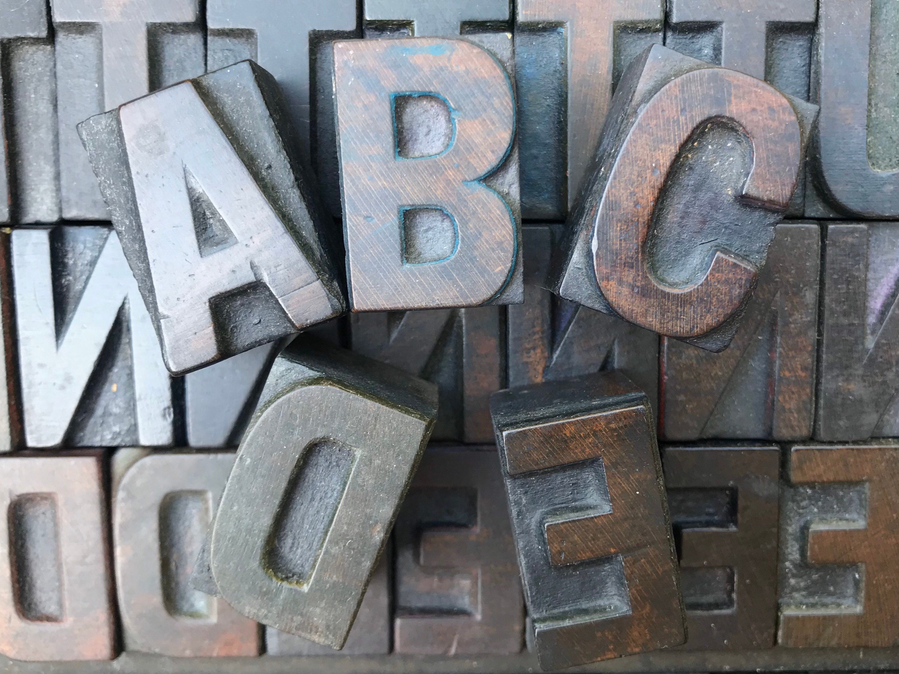 wooden letterpress print block capital letters wood type alphabet