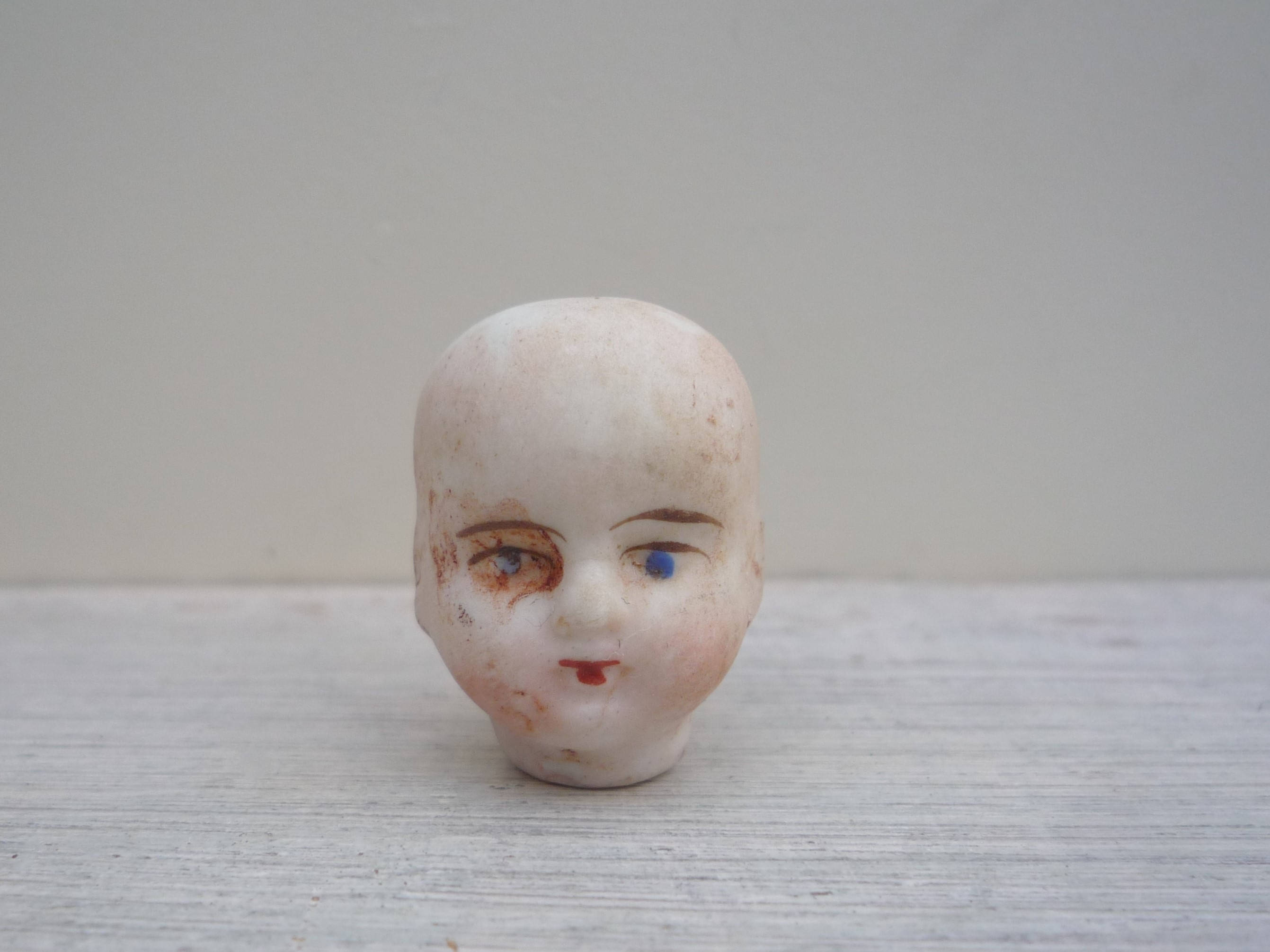 vintage porcelain doll heads