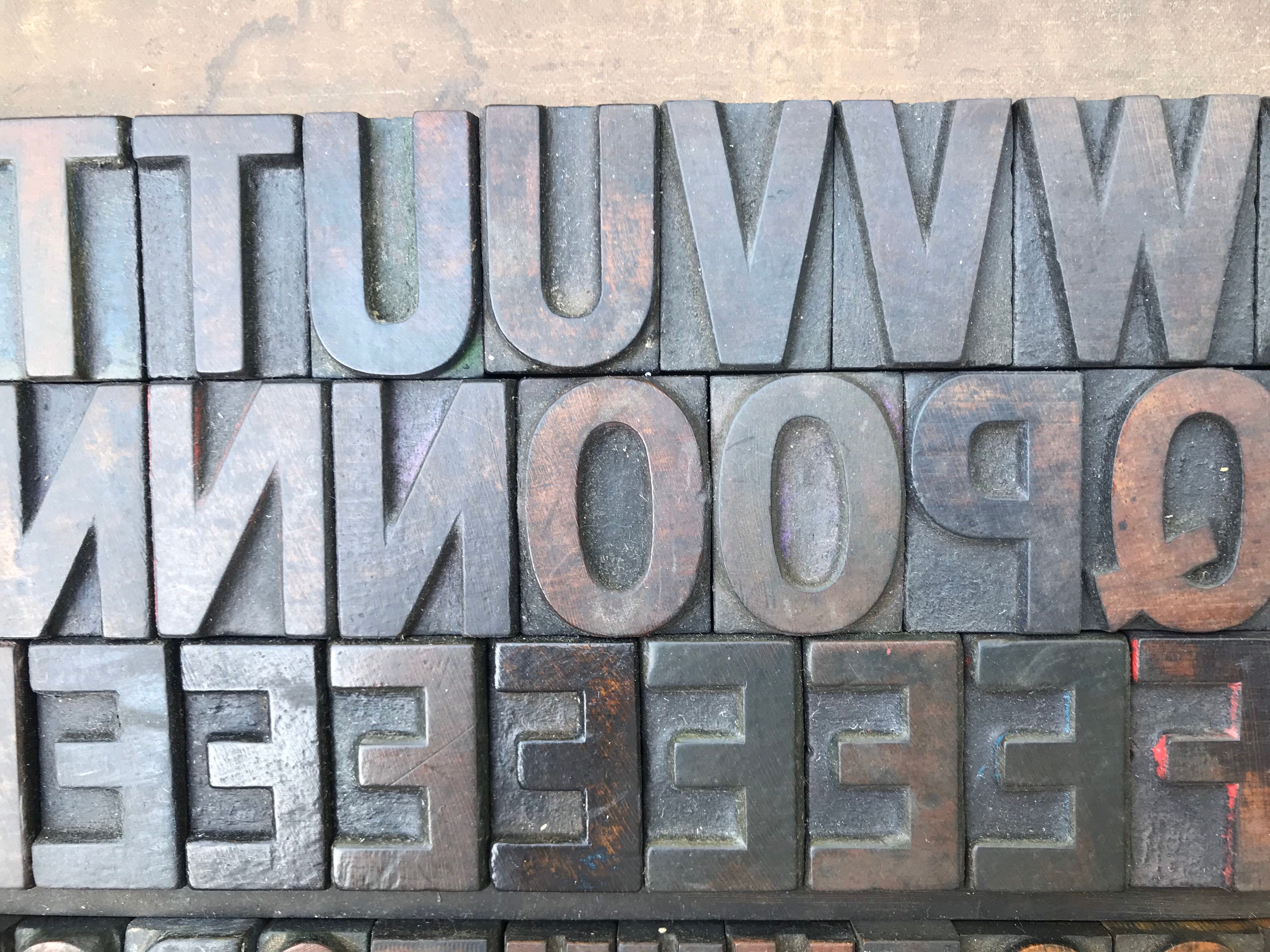 wooden letterpress print block capital letters wood type alphabet