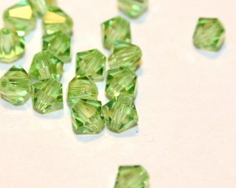 Swarovski Beads in Peridot Light Green - Art 5301 Crystal Bicone Beads - 4mm (SW-A17)