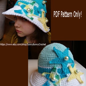 May include: A crochet hat with a white brim and a blue and green crown. The hat is decorated with three crocheted starfish, two in blue and one in yellow. The starfish are accented with white pearl beads. The hat is for sale as a PDF pattern only. The text "PDF Pattern Only!" is displayed on a brown background.