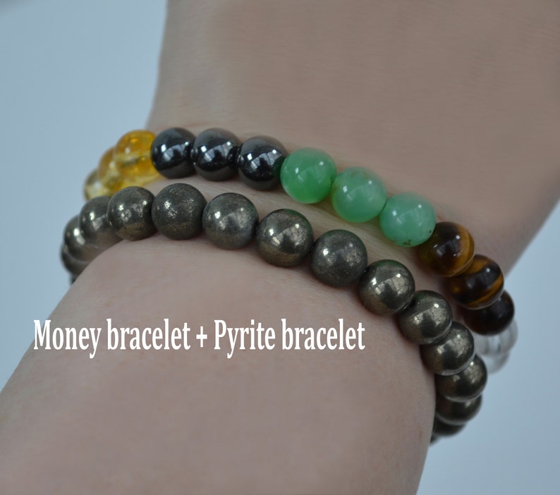 May include: Two beaded bracelets. One bracelet features pyrite beads, the other has a mix of citrine, hematite, green aventurine, and tiger's eye beads. The text on the image reads "Money bracelet + Pyrite bracelet."